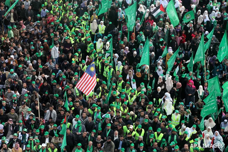 Palestinian Hamas supporters attend a Hamas rally marking the 25th anniversary of the Islamist movement's founding in Gaza City on December 8, 2012. Hamas chief Khaled Meshaal arrived to Gaza strip on December 7 during h...