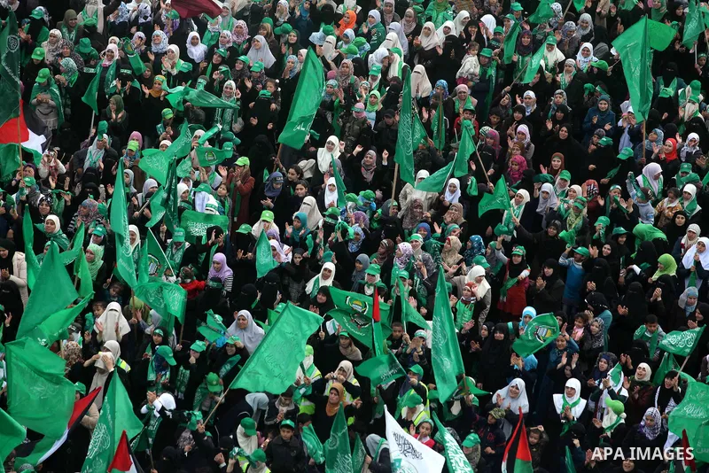 Palestinian Hamas supporters attend a Hamas rally marking the 25th anniversary of the Islamist movement's founding in Gaza City on December 8, 2012. Hamas chief Khaled Meshaal arrived to Gaza strip on December 7 during h...