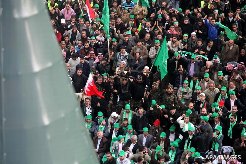 Palestinian Hamas supporters attend a Hamas rally marking the 25th anniversary of the Islamist movement's founding in Gaza City on December 8, 2012. Hamas chief Khaled Meshaal arrived to Gaza strip on December 7 during h...