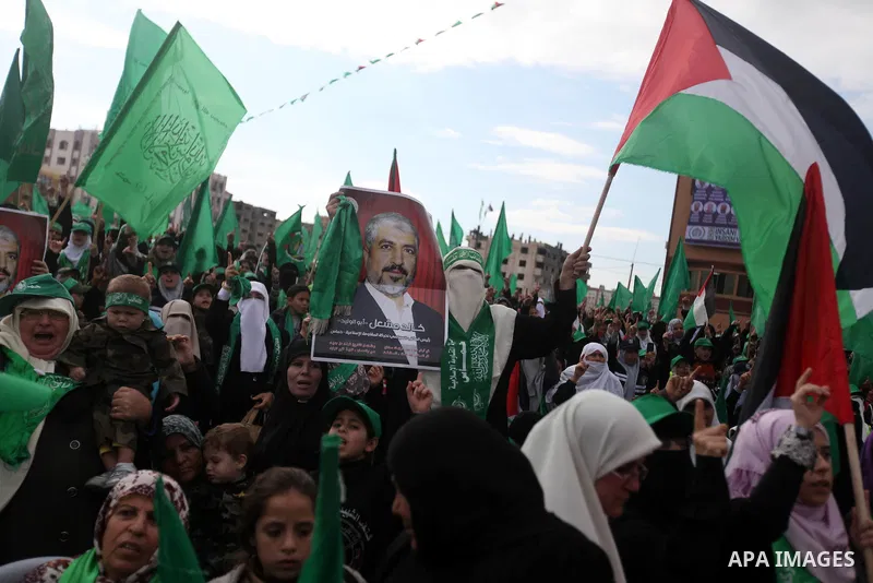 Palestinian Hamas supporters attend a Hamas rally marking the 25th anniversary of the Islamist movement's founding in Gaza City on December 8, 2012. Hamas chief Khaled Meshaal arrived to Gaza strip on December 7 during h...
