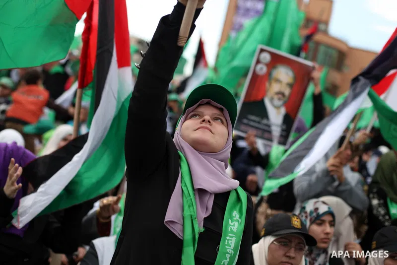 Palestinian Hamas supporters attend a Hamas rally marking the 25th anniversary of the Islamist movement's founding in Gaza City on December 8, 2012. Hamas chief Khaled Meshaal arrived to Gaza strip on December 7 during h...