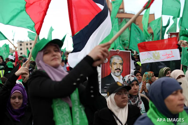 Palestinian Hamas supporters attend a Hamas rally marking the 25th anniversary of the Islamist movement's founding in Gaza City on December 8, 2012. Hamas chief Khaled Meshaal arrived to Gaza strip on December 7 during h...