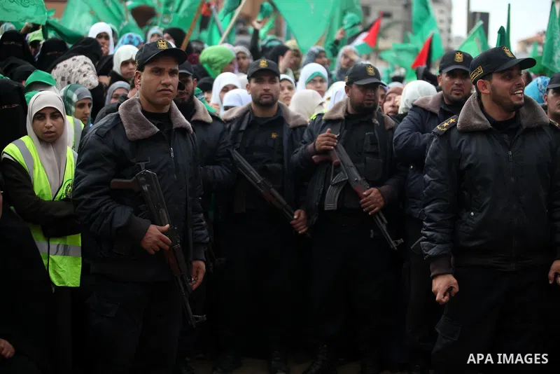 Palestinian Hamas supporters attend a Hamas rally marking the 25th anniversary of the Islamist movement's founding in Gaza City on December 8, 2012. Hamas chief Khaled Meshaal arrived to Gaza strip on December 7 during h...