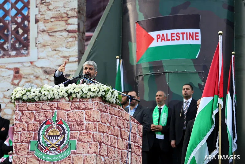 Hamas chief Khaled Meshaal speaks during a Hamas rally marking the 25th anniversary of the Islamist movement's founding in Gaza City on December 8, 2012. Meshaal arrived to Gaza strip on December 7 during his first-ever...
