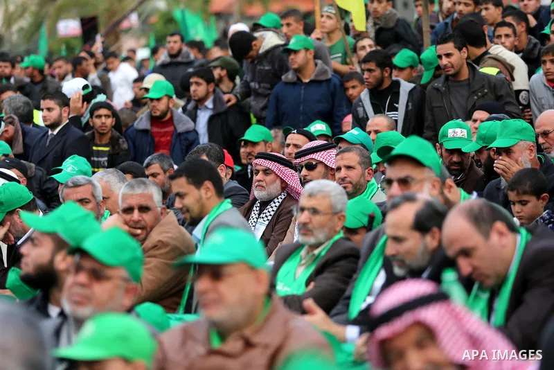 Palestinian Hamas supporters attend a Hamas rally marking the 25th anniversary of the Islamist movement's founding in Gaza City on December 8, 2012. Hamas chief Khaled Meshaal arrived to Gaza strip on December 7 during h...
