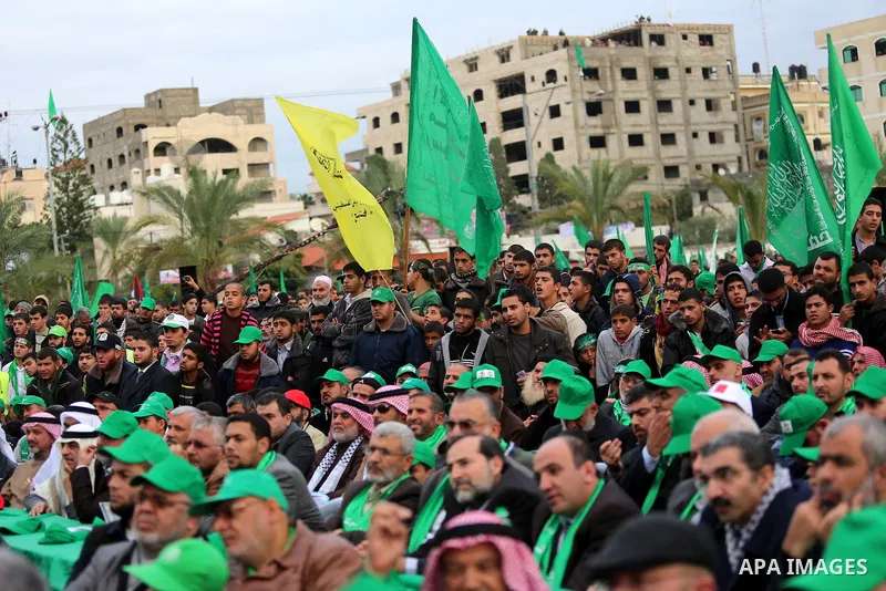 Palestinian Hamas supporters attend a Hamas rally marking the 25th anniversary of the Islamist movement's founding in Gaza City on December 8, 2012. Hamas chief Khaled Meshaal arrived to Gaza strip on December 7 during h...