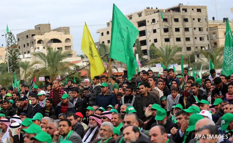 Palestinian Hamas supporters attend a Hamas rally marking the 25th anniversary of the Islamist movement's founding in Gaza City on December 8, 2012. Hamas chief Khaled Meshaal arrived to Gaza strip on December 7 during h...