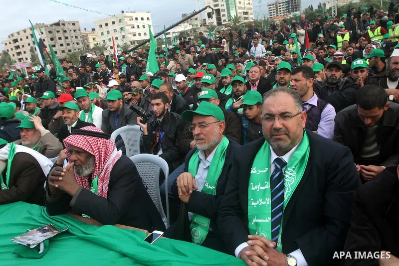 Palestinian Hamas leaders attend a Hamas rally marking the 25th anniversary of the Islamist movement's founding in Gaza City on December 8, 2012. Hamas chief Khaled Meshaal arrived to Gaza strip on December 7 during his...