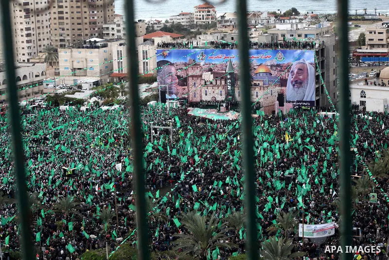 Palestinian Hamas supporters attend a Hamas rally marking the 25th anniversary of the Islamist movement's founding in Gaza City on December 8, 2012. Hamas chief Khaled Meshaal arrived to Gaza strip on December 7 during h...