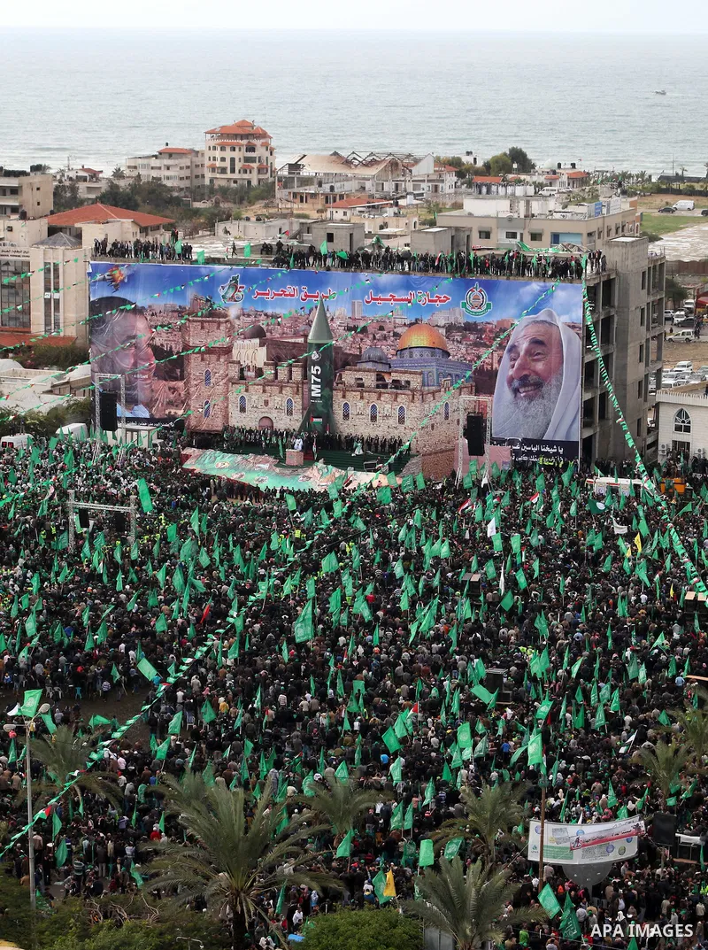 Palestinian Hamas supporters attend a Hamas rally marking the 25th anniversary of the Islamist movement's founding in Gaza City on December 8, 2012. Hamas chief Khaled Meshaal arrived to Gaza strip on December 7 during h...