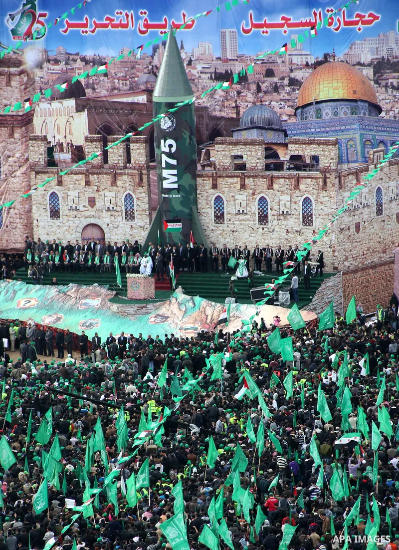 Palestinian Hamas supporters attend a Hamas rally marking the 25th anniversary of the Islamist movement's founding in Gaza City on December 8, 2012. Hamas chief Khaled Meshaal arrived to Gaza strip on December 7 during h...