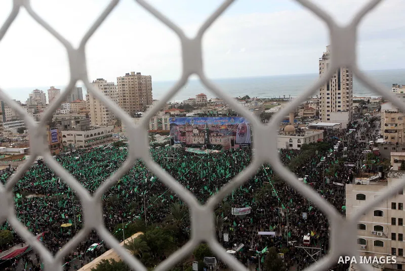 Palestinian Hamas supporters attend a Hamas rally marking the 25th anniversary of the Islamist movement's founding in Gaza City on December 8, 2012. Hamas chief Khaled Meshaal arrived to Gaza strip on December 7 during h...