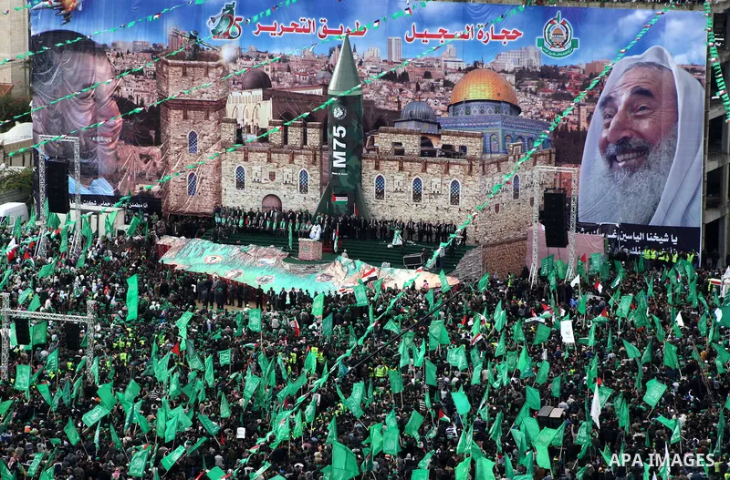 Palestinian Hamas supporters attend a Hamas rally marking the 25th anniversary of the Islamist movement's founding in Gaza City on December 8, 2012. Hamas chief Khaled Meshaal arrived to Gaza strip on December 7 during h...