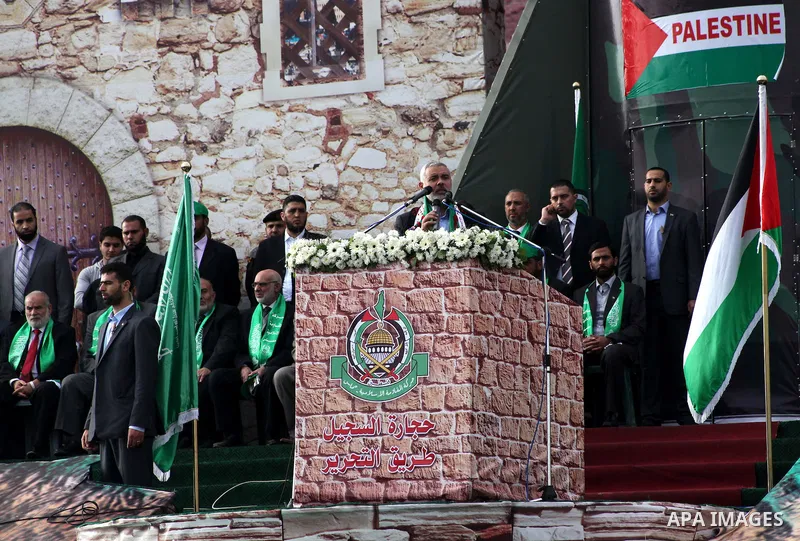 Palestinian prime minister in Gaza Strip, Ismail Haniyah speaks during a Hamas rally marking the 25th anniversary of the Islamist movement's founding in Gaza City on December 8, 2012. Meshaal arrived to Gaza strip on Dec...