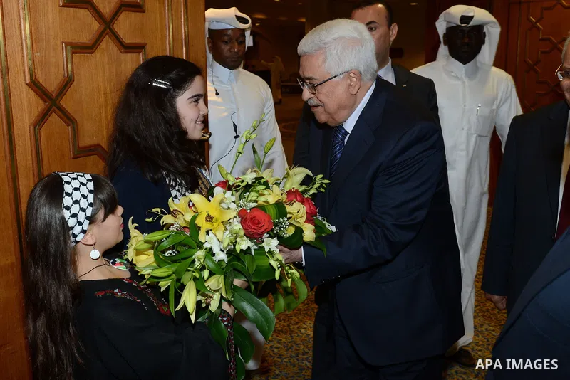 Palestinian President Mahmoud Abbas (Abu Mazen), meets with of the Palestinian community in Doha, on Nov. 08, 2012 . Photo by Thaer Ganaim