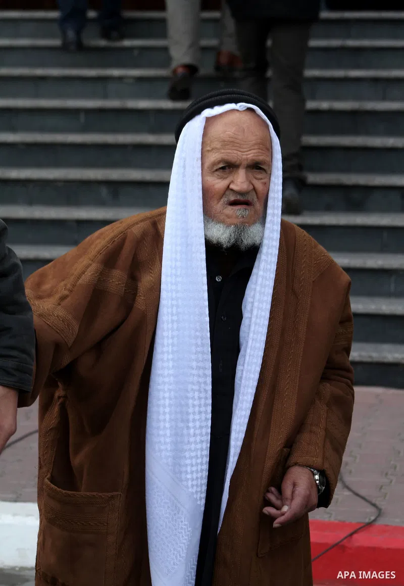 A Palestinian man attends during visit Hamas chief in exile Khaled Meshaal to the Islamic University in Gaza City on December 9, 2012. Meshaal rejected ceding "an inch" of Palestinian territory to Israel or recognising t...
