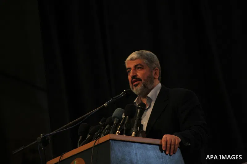 Hamas chief Khaled Meshaal, speaks during a meeting with the relatives of Palestinian prisoners in Israeli jails in Gaza City December 9, 2012. Meshaal, in a defiant speech during his first ever visit to Gaza, told a mas...