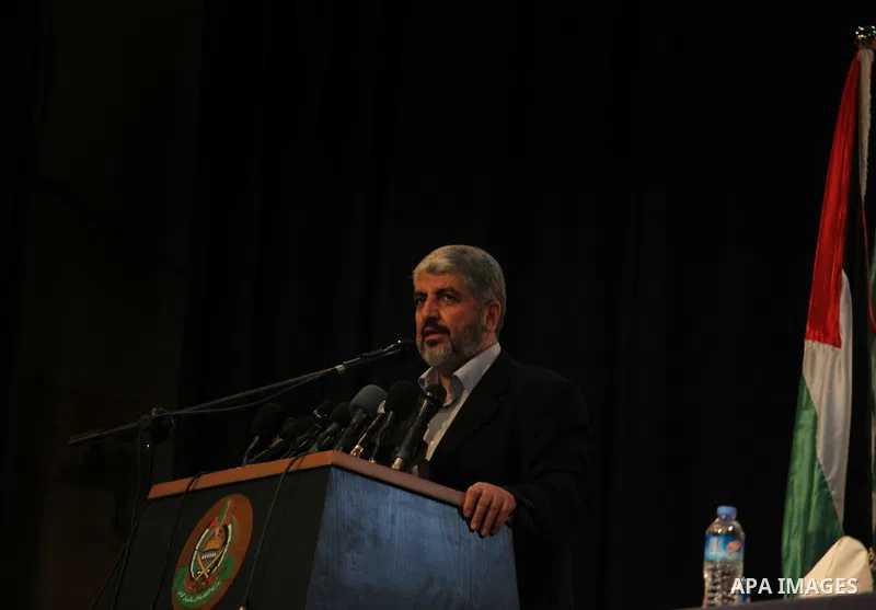 Hamas chief Khaled Meshaal, speaks during a meeting with the relatives of Palestinian prisoners in Israeli jails in Gaza City December 9, 2012. Meshaal, in a defiant speech during his first ever visit to Gaza, told a mas...