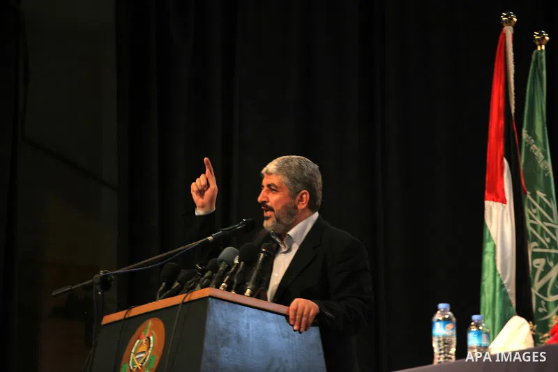 Hamas chief Khaled Meshaal, speaks during a meeting with the relatives of Palestinian prisoners in Israeli jails in Gaza City December 9, 2012. Meshaal, in a defiant speech during his first ever visit to Gaza, told a mas...