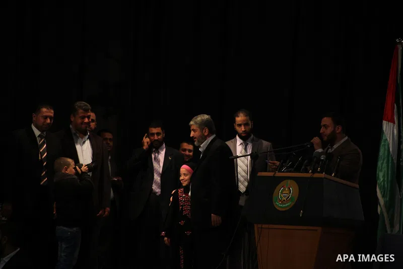 Hamas chief Khaled Meshaal, speaks during a meeting with the relatives of Palestinian prisoners in Israeli jails in Gaza City December 9, 2012. Meshaal, in a defiant speech during his first ever visit to Gaza, told a mas...
