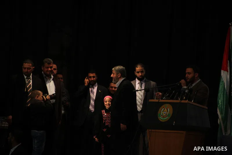 Hamas chief Khaled Meshaal, speaks during a meeting with the relatives of Palestinian prisoners in Israeli jails in Gaza City December 9, 2012. Meshaal, in a defiant speech during his first ever visit to Gaza, told a mas...