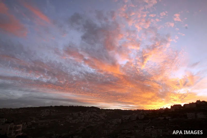 A general image shows the sunset over Jerusalem's old city, December 9, 2012. Photo by Mahfouz Abu Turk