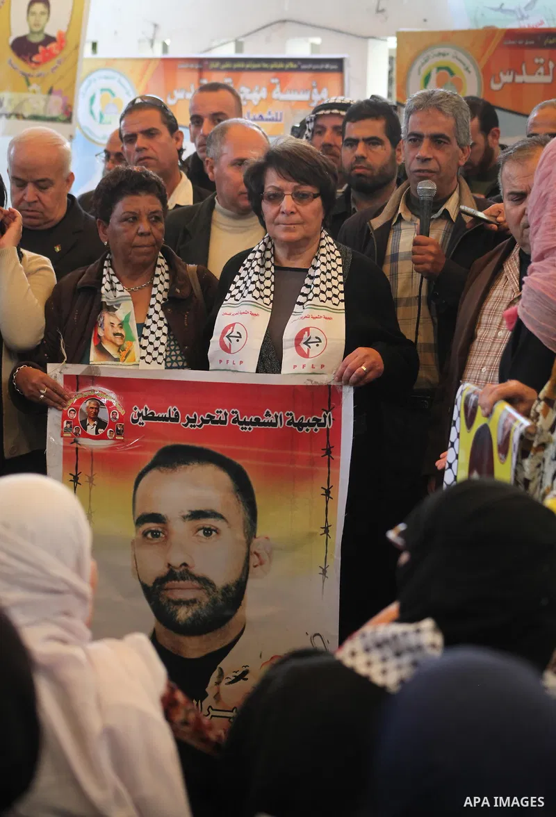 Leila Khaled participates a weekly activity calling for their liberty at the Red Cross headquarters in Gaza City on December 10, 2012. Photo by Ashraf Amra