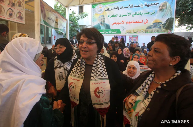 Leila Khaled participates a weekly activity calling for their liberty at the Red Cross headquarters in Gaza City on December 10, 2012. Photo by Ashraf Amra