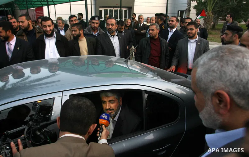 Hamas leader in exile Khaled Meshaal speaks to media, upon his departure from the Gaza Strip on December 10, 2012 in Rafah, on the border with Egypt. Exiled Hamas chief Khaled Meshaal left Gaza after a historic first vis...