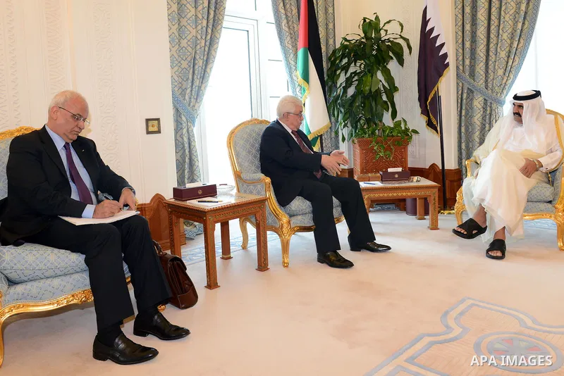 Palestinian President Mahmoud Abbas meets with Qatari Emir, Sheikh Hamad bin Khalifa Al-Thani, in Doha on December 10, 2012. Photo by Thaer Ganaim