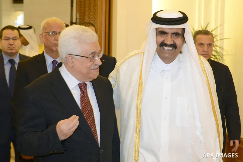Palestinian President Mahmoud Abbas meets with Qatari Emir, Sheikh Hamad bin Khalifa Al-Thani, in Doha on December 10, 2012. Photo by Thaer Ganaim