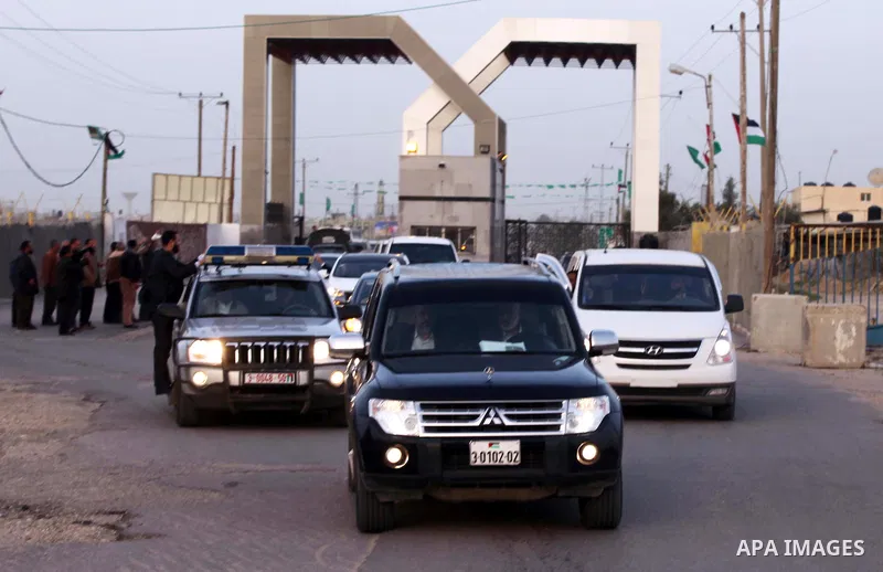 Hamas leader in exile Khaled Meshaal and Palestinian Prime Minister in the Gaza Strip Ismail Haniya ride their car to the Rafah crossing border, upon Meshaal departure from the Gaza Strip on December 10, 2012 in Gaza. Ex...