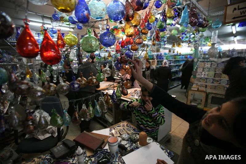 Palestinians buy a different types of glasses in AL-SALAM factory in the West Bank city of Hebron December 12, 2012. Glass has been a traditional industry in Hebron for over 600 years but as a result of the increased vio...