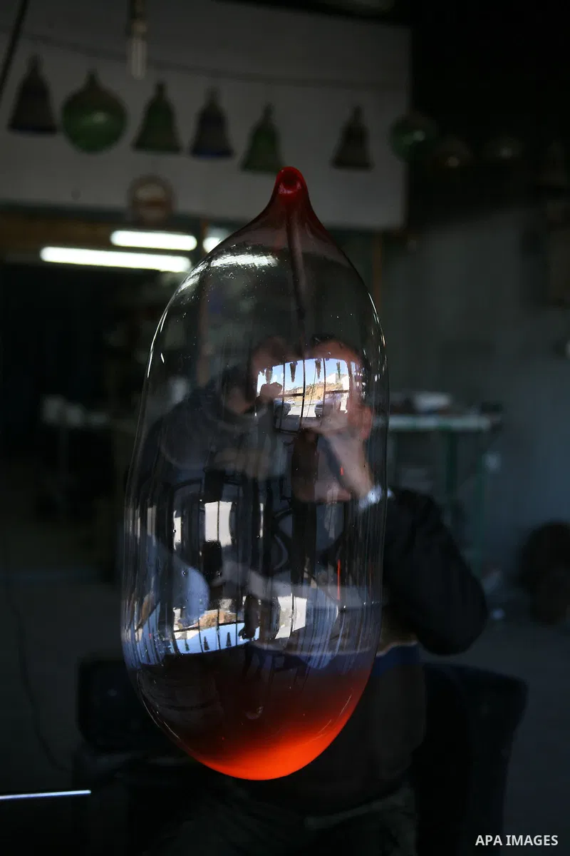 A Palestinian worker makes a different types of glasses in AL-SALAM factory in the West Bank city of Hebron December 12, 2012. Glass has been a traditional industry in Hebron for over 600 years but as a result of the inc...