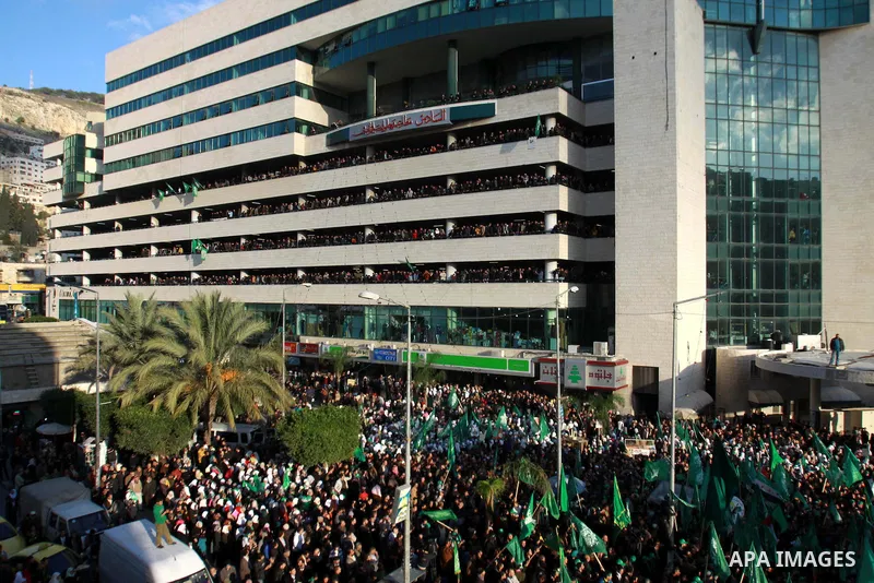 Palestinian Hamas supporters attend a Hamas rally marking the 25th anniversary of the Islamist movement's founding in the West Bank city of Nablus on December 13, 2012. Rapprochement between rival Palestinian factions Ha...