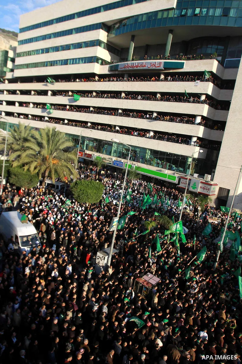 Palestinian Hamas supporters attend a Hamas rally marking the 25th anniversary of the Islamist movement's founding in the West Bank city of Nablus on December 13, 2012. Rapprochement between rival Palestinian factions Ha...
