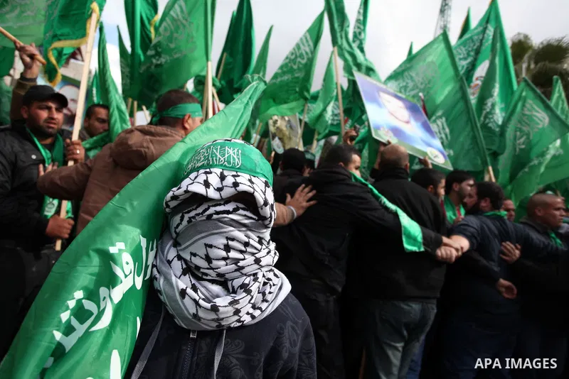 Palestinian supporters of Hamas attend a rally marking the 25th anniversary of the Islamist movement's foundation in the West bank city of Ramallah, 14 December 2012. Hamas held its first rally in the West Bank on 13 Dec...
