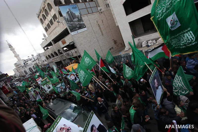 Palestinian supporters of Hamas attend a rally marking the 25th anniversary of the Islamist movement's foundation in the West bank city of Ramallah, 14 December 2012. Hamas held its first rally in the West Bank on 13 Dec...