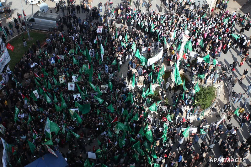 Palestinian supporters of Hamas attend a rally marking the 25th anniversary of the Islamist movement's foundation in the West bank city of Ramallah, 14 December 2012. Hamas held its first rally in the West Bank on 13 Dec...