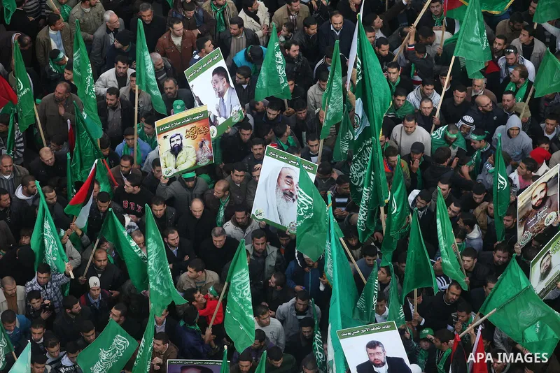 Palestinian supporters of Hamas attend a rally marking the 25th anniversary of the Islamist movement's foundation in the West bank city of Ramallah, 14 December 2012. Hamas held its first rally in the West Bank on 13 Dec...