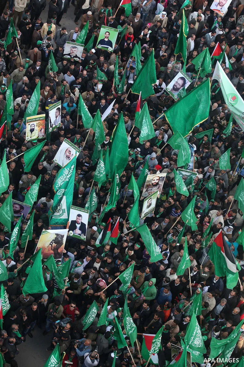Palestinian supporters of Hamas attend a rally marking the 25th anniversary of the Islamist movement's foundation in the West bank city of Ramallah, 14 December 2012. Hamas held its first rally in the West Bank on 13 Dec...