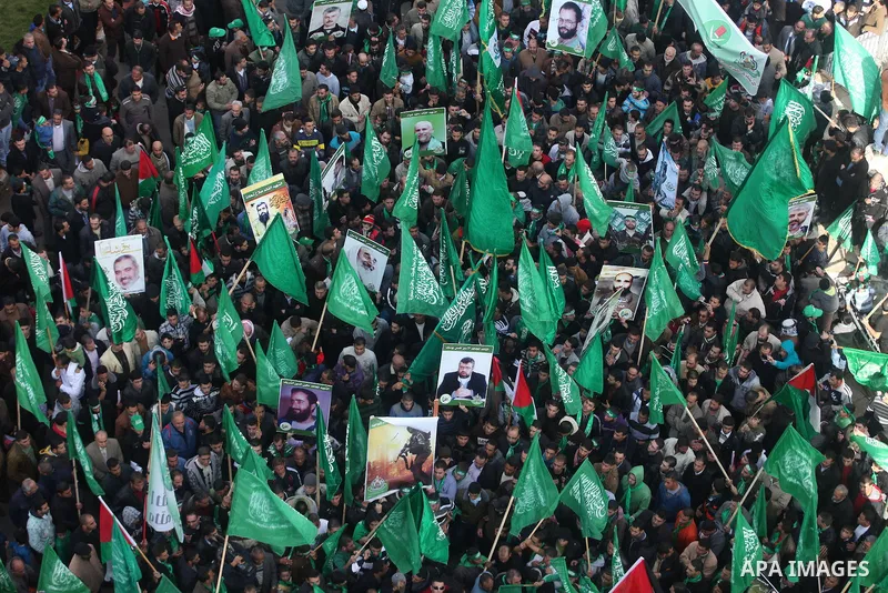 Palestinian supporters of Hamas attend a rally marking the 25th anniversary of the Islamist movement's foundation in the West bank city of Ramallah, 14 December 2012. Hamas held its first rally in the West Bank on 13 Dec...