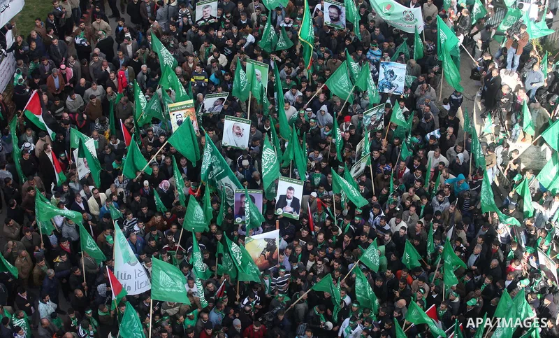 Palestinian supporters of Hamas attend a rally marking the 25th anniversary of the Islamist movement's foundation in the West bank city of Ramallah, 14 December 2012. Hamas held its first rally in the West Bank on 13 Dec...
