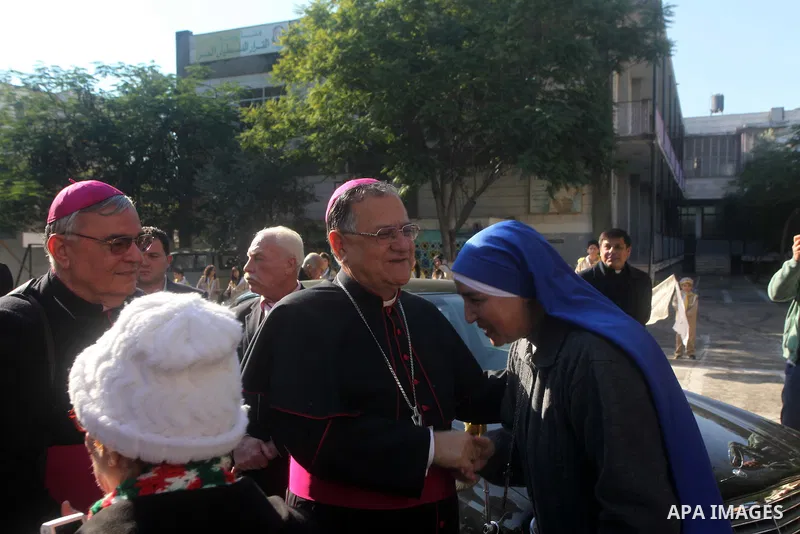 Latin Patriarch of Jerusalem Fouad Twal arrives at Deir al-Latin Church in Gaza City, Dec. 16, 2012. Twal arrived in Gaza on Sunday to attend a celebration with Palestinians ahead of Christmas. Photo by Ashraf Amra