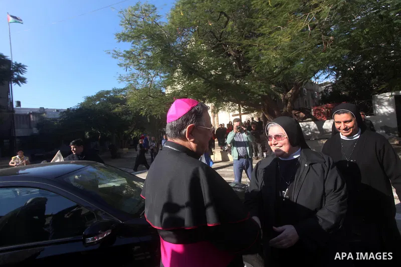 Latin Patriarch of Jerusalem Fouad Twal arrives at Deir al-Latin Church in Gaza City, Dec. 16, 2012. Twal arrived in Gaza on Sunday to attend a celebration with Palestinians ahead of Christmas. Photo by Ashraf Amra