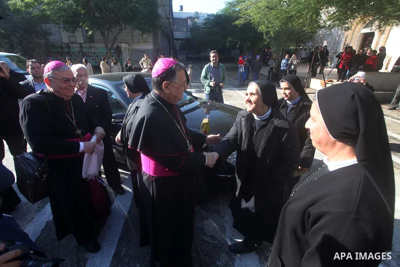 Latin Patriarch of Jerusalem Fouad Twal arrives at Deir al-Latin Church in Gaza City, Dec. 16, 2012. Twal arrived in Gaza on Sunday to attend a celebration with Palestinians ahead of Christmas. Photo by Ashraf Amra