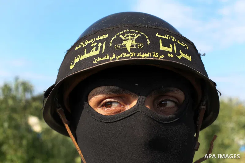 A Palestinian militant from al-Quds Brigades the armed wing of the Islamic Jihad organization, stands during military exercises at an undisclosed location in the Hamas-run Gaza Strip in Gaza city on Dec 16. 2012. Hamas'...