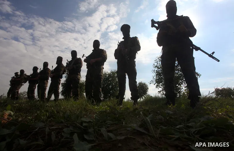 Palestinian militants from al-Quds Brigades the armed wing of the Islamic Jihad organization, stand during military exercises at an undisclosed location in the Hamas-run Gaza Strip in Gaza city on Dec 16. 2012. Hamas' ar...