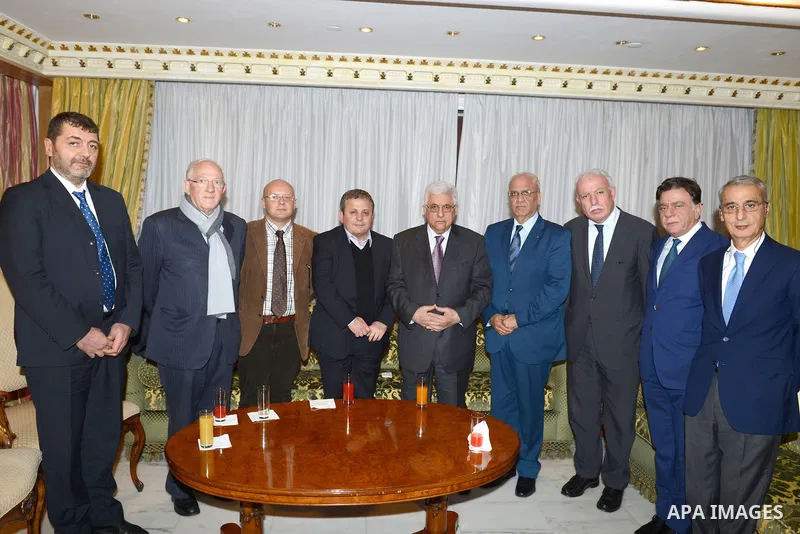 Palestinian President Mahmoud Abbas meets with the mayor of Naples during an official visit to Italy, 16 December 2012. Photo by Thaer Ganaim