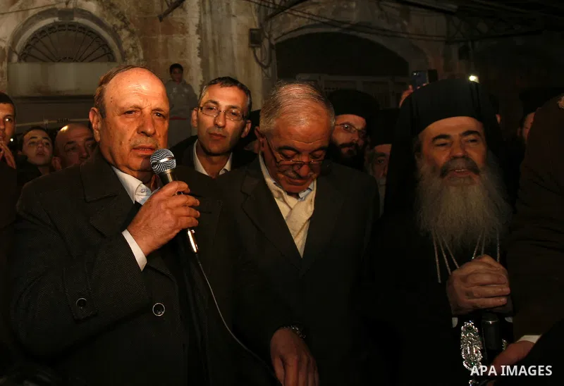 Greek Orthodox Patriarch of Jerusalem Theophilos III celebrates the lighting of the Christmas tree in the old city of Jerusalem, on December 16, 2012. Photo by Mahfouz Abu Turk